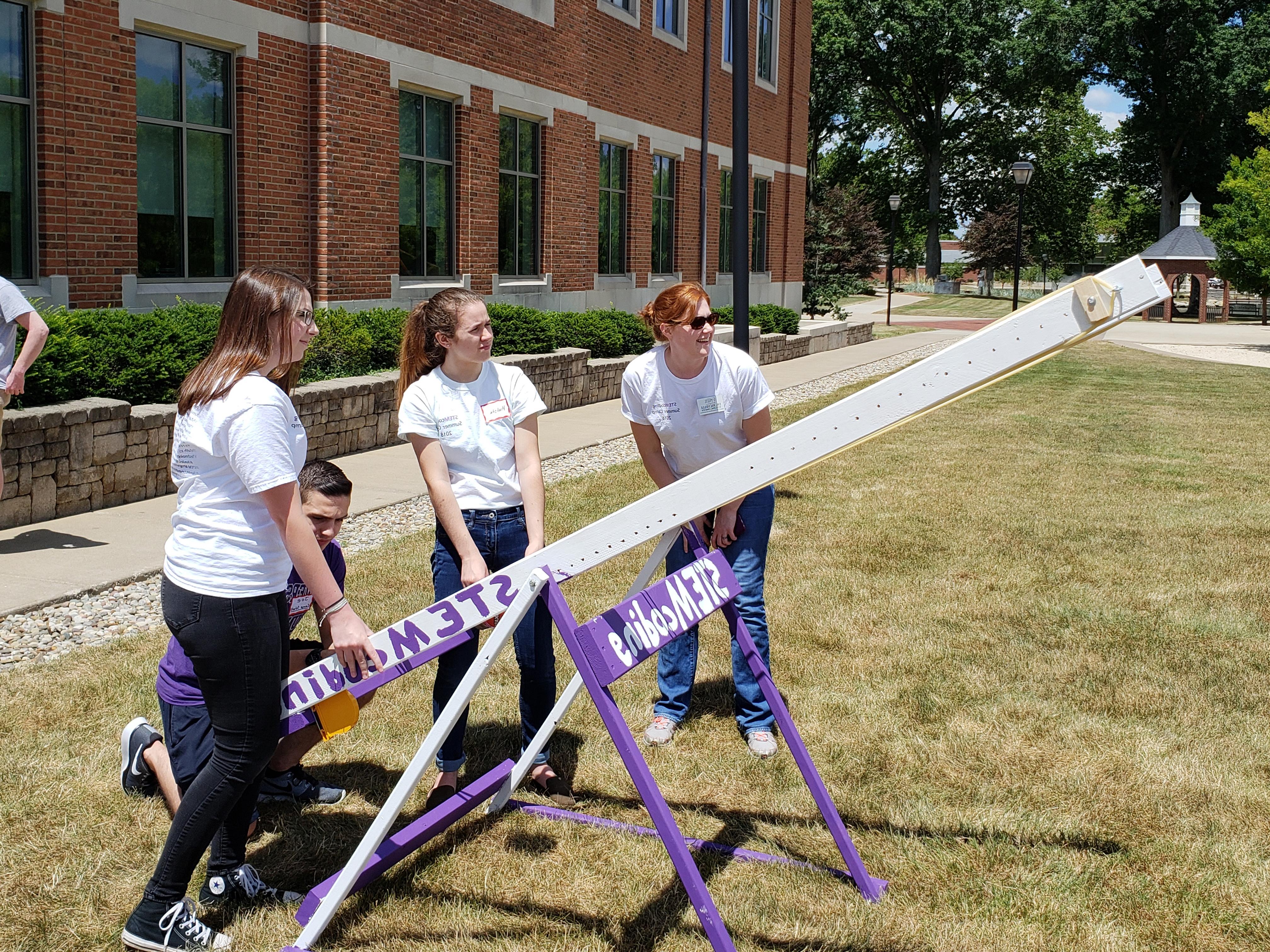 Stemcoding students participate in an experiment with Mount Union faculty member.